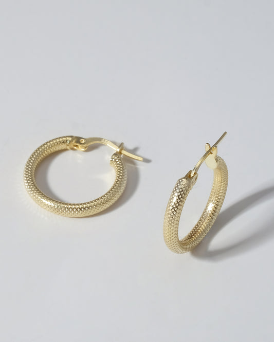 CORINTH HUGGIE HOOP EARRINGS